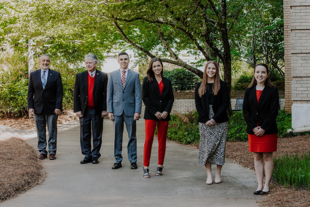 From left, CAES Dean Nick Place and Associate Dean Joe Broder with CAES Congressional Agricultural Fellows Clay Parker, Ivy English, Brooke Raniere and Abby Lauterbach.