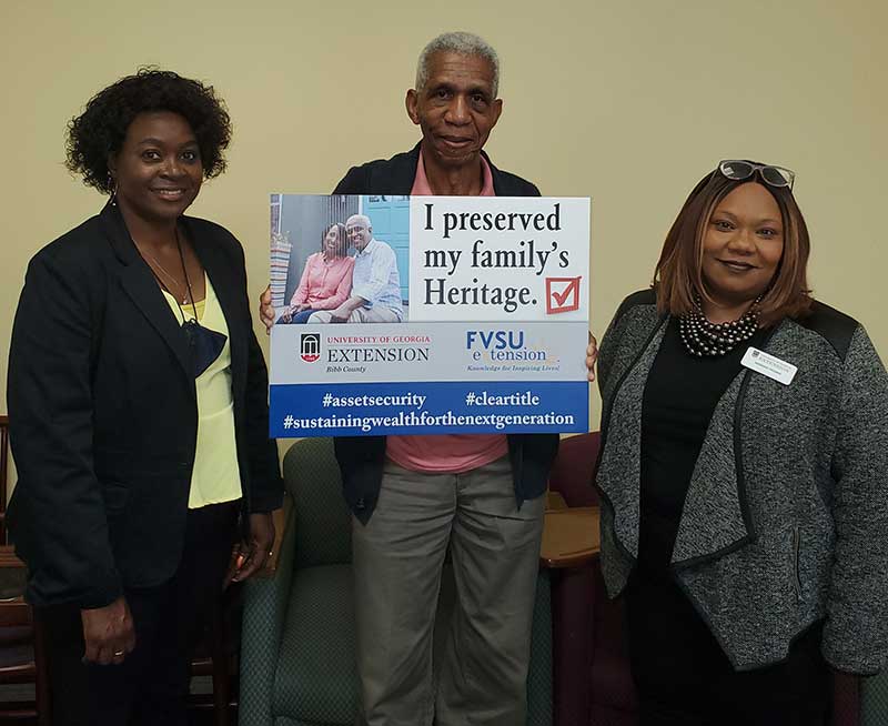 Fort Valley State FACS agents Brenda Maddox stands with a client of the Georgia Farmers Initiative for Training and Sustainability (GA-FITS) program and Keishon Thomas, a UGA Extension Family and Consumer Sciences agent in Bibb County.