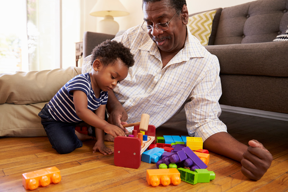 Adult playing with child