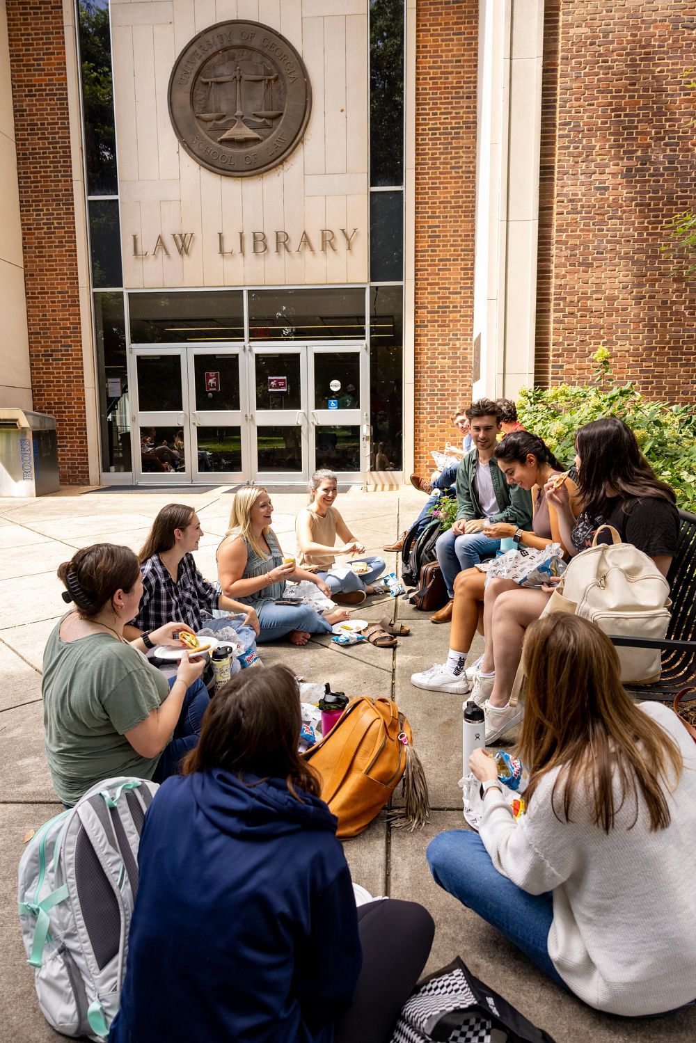 Students in the School of Law socialize at a picnic on North Campus celebrating the school's Welcome Week.