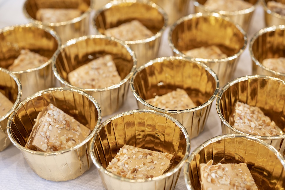 Samples of desserts in small gold cups at the 2022 Flavor of Georgia event