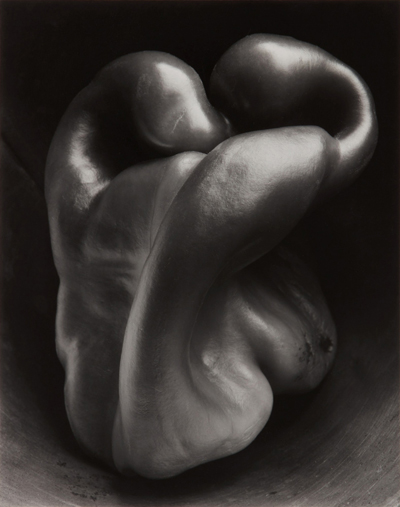 Edward Weston's famous photo, Pepper No. 30, shows a distorted bell pepper on a simple background in black and white.
