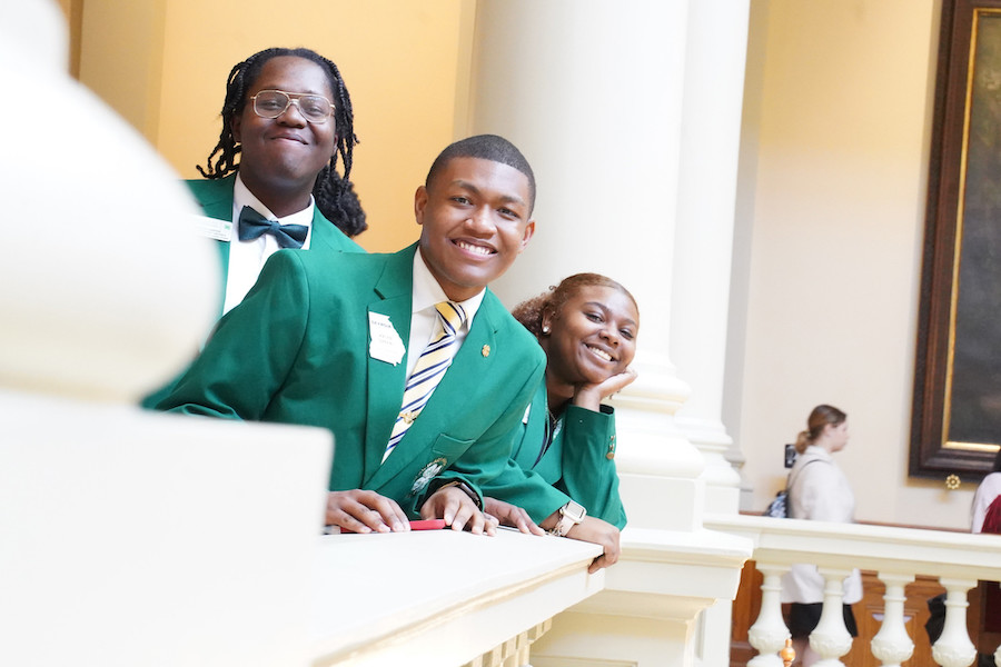 From left, Timothy Carter from Richmond County, Kaleb Green from Dooly County, and Kayla Flowers from Twiggs County are on a self-guided tour of the Capitol after meeting with their elected representative.